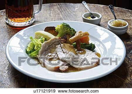 Plate of roast pork with vegetables View Large Photo Image Stock Photo - Plate of roast pork with vegetables. Fotosearch