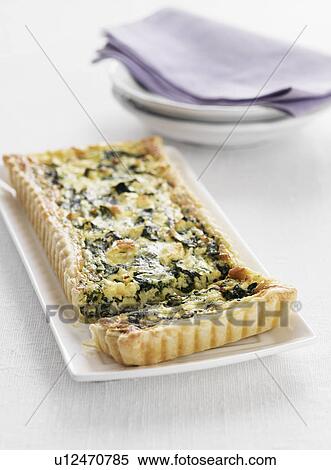 Stock Photography - Plate of spinach tart. Fotosearch