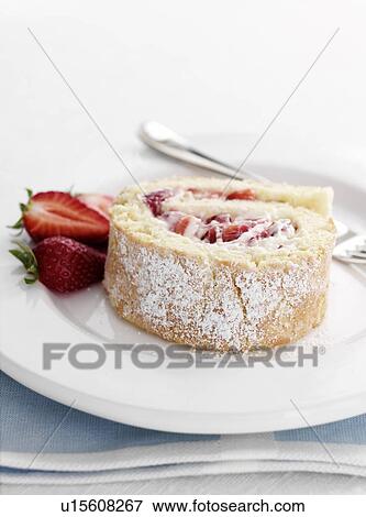 Plate of strawberry swiss roll View Large Photo Image Stock Photo - Plate of strawberry swiss roll. Fotosearch