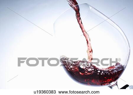 Red wine pouring into glass View Large Photo Image Stock Image - Red wine pouring into glass. Fotosearch