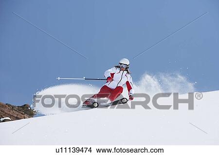 Skier coasting on snowy slope View Large Photo Image Picture - Skier coasting on snowy slope. Fotosearch