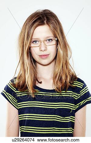 Smiling girl wearing glasses View Large Photo Image Picture - Smiling girl wearing glasses. Fotosearch