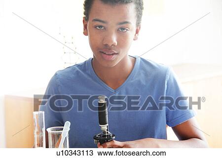 Student working in science lab View Large Photo Image Stock Image - Student working in science lab. Fotosearch