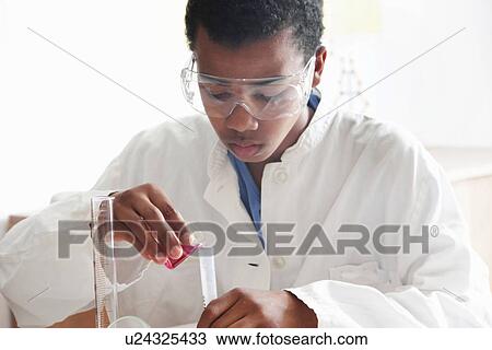 Student working in science lab View Large Photo Image Stock Image - Student working in science lab. Fotosearch