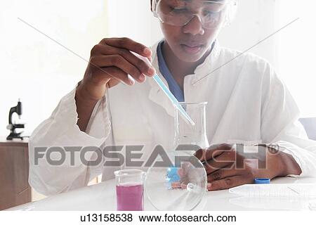 Student working in science lab View Large Photo Image Stock Photo - Student working in science lab. Fotosearch