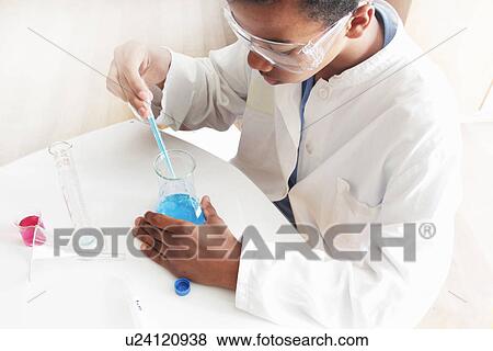 Student working in science lab View Large Photo Image Stock Photo - Student working in science lab. Fotosearch