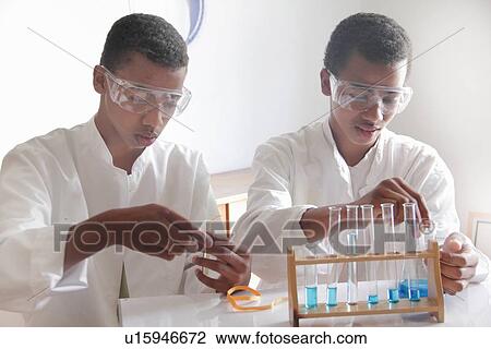 Students working in science lab View Large Photo Image Stock Image - Students working in science lab. Fotosearch