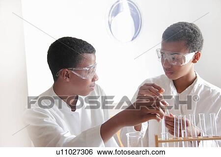 Students working in science lab View Large Photo Image Stock Photograph - Students working in science lab. Fotosearch