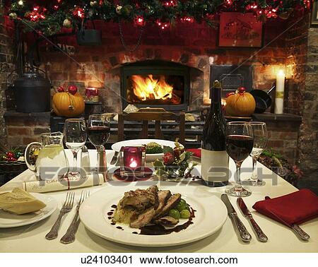 Table laid for Christmas dinner View Large Photo Image Stock Image - Table laid for Christmas dinner. Fotosearch