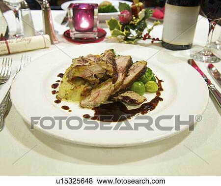 Table laid for Christmas dinner View Large Photo Image Stock Photo - Table laid for Christmas dinner. Fotosearch