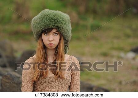 Teenage girl wearing fur hat outdoors View Large Photo Image Stock Photo - Teenage girl wearing fur hat outdoors. Fotosearch