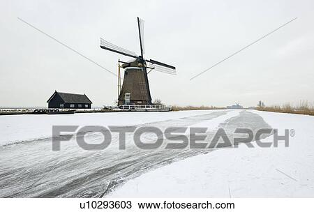Windmill in snowy landscape View Large Photo Image Stock Image - Windmill in snowy landscape. Fotosearch