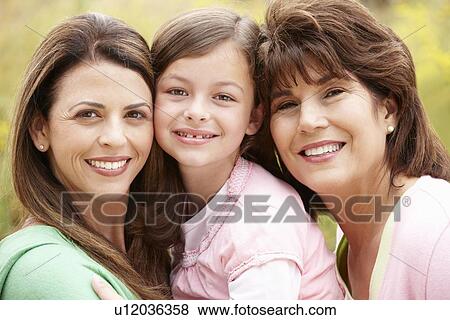 Stock Photo - 3 generations Hispanic women. Fotosearch
