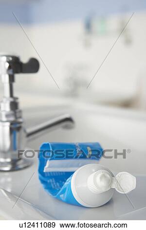 Stock Photo - Almost empty toothpaste tube. Fotosearch