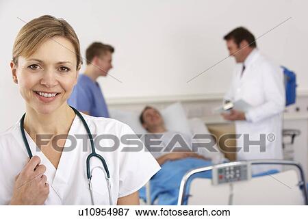 American doctor and team on hospital ward View Large Photo Image Stock Photo - American doctor and team on hospital ward. Fotosearch