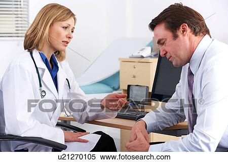 Stock Photography - American doctor talking to depressed businessman. Fotosearch