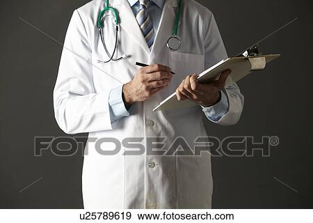 American doctor with clipboard and stethoscope View Large Photo Image Stock Photo - American doctor with clipboard and stethoscope. Fotosearch