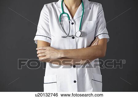 Stock Photograph - American nurse studio portrait cropped. Fotosearch