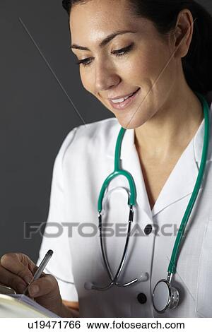 American nurse with stethoscope and clipboard View Large Photo Image Stock Photograph - American nurse with stethoscope and clipboard. Fotosearch