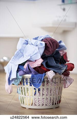basket of dirty washing in bathroom View Large Photo Image Picture - basket of dirty washing in bathroom. Fotosearch