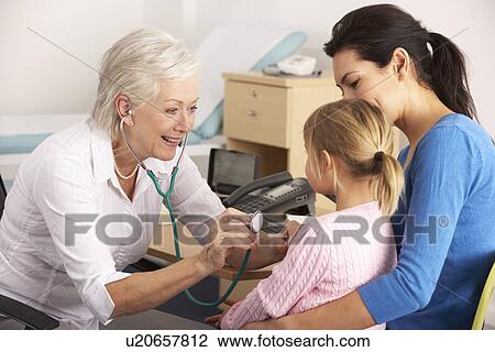 British GP examining young child with mother View Large Photo Image Stock Image - British GP examining young child with mother. Fotosearch