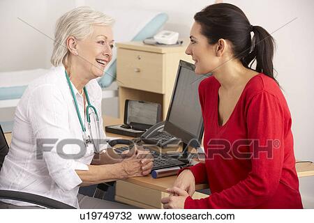 British GP talking to woman patient View Large Photo Image Stock Image - British GP talking to woman patient. Fotosearch