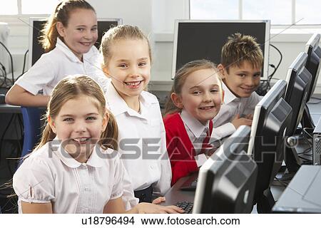 Children using computers in school class View Large Photo Image Picture - Children using computers in school class. Fotosearch