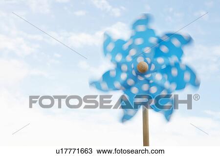 Child's plastic windmill turning in wind View Large Photo Image Stock Image - Child's plastic windmill turning in wind. Fotosearch
