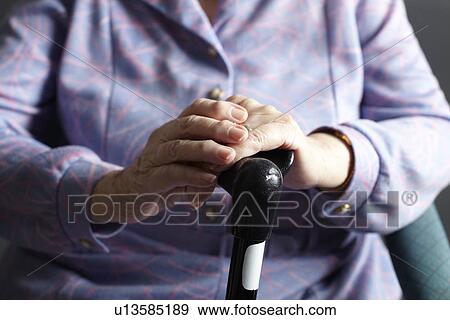 Close Up Of Senior Woman Holding Walking Stick View Large Photo Image Stock Photo - Close Up Of Senior Woman Holding Walking Stick. Fotosearch