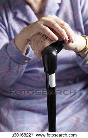 Close Up Of Senior Woman Holding Walking Stick View Large Photo Image Stock Photo - Close Up Of Senior Woman Holding Walking Stick. Fotosearch