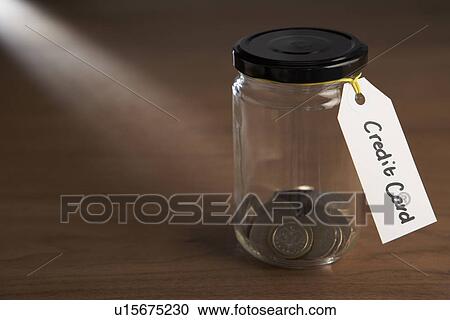 Coins in a jam jar View Large Photo Image Stock Image - Coins in a jam jar. Fotosearch