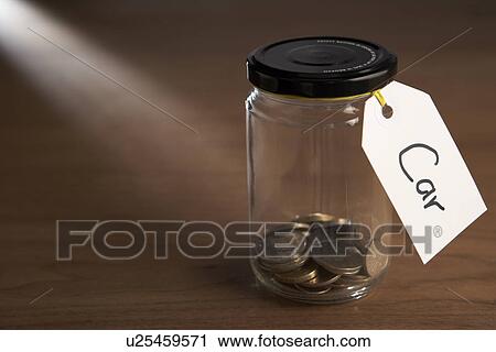 Coins in a jam jar View Large Photo Image Stock Image - Coins in a jam jar. Fotosearch