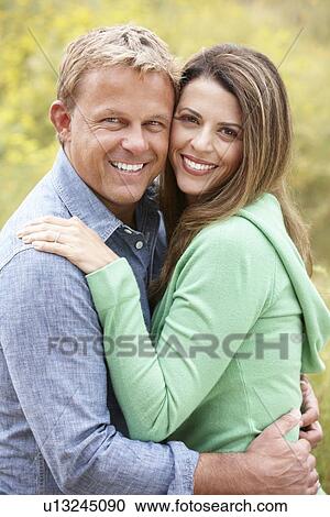 Couple outdoors View Large Photo Image Stock Image - Couple outdoors. Fotosearch