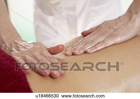 Stock Image - Detail woman having back massage. Fotosearch