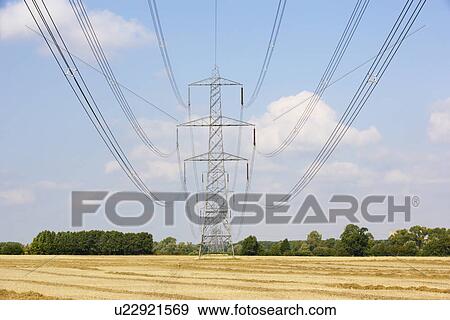 Electricity pylons in countryside View Large Photo Image Stock Photo - Electricity pylons in countryside. Fotosearch