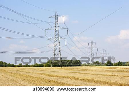 Electricity pylons in countryside View Large Photo Image Stock Photograph - Electricity pylons in countryside. Fotosearch
