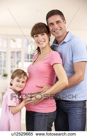 Family expecting new baby View Large Photo Image Stock Photography - Family expecting new baby. Fotosearch