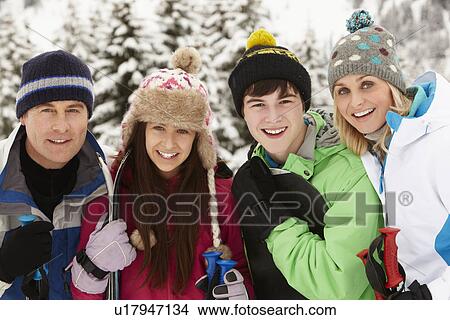 Family On Ski Holiday In Mountains View Large Photo Image Picture - Family On Ski Holiday In Mountains. Fotosearch