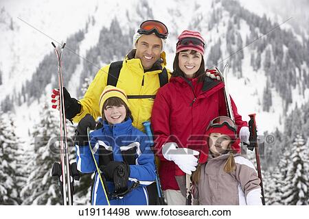 Family On Ski Holiday In Mountains View Large Photo Image Stock Photo - Family On Ski Holiday In Mountains. Fotosearch