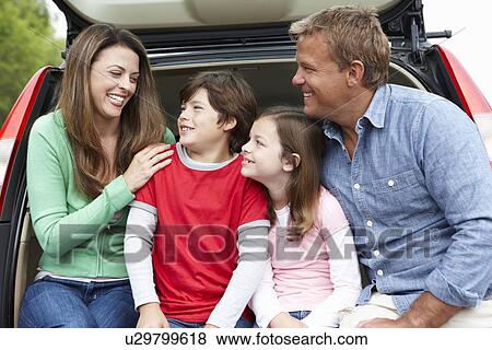 Family outdoors with car View Large Photo Image Stock Photo - Family outdoors with car. Fotosearch