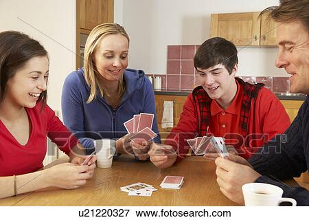Family Playing Cards In Kitchen View Large Photo Image Stock Photo - Family Playing Cards In Kitchen. Fotosearch