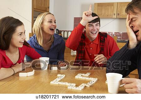 Family Playing Dominoes In Kitchen View Large Photo Image Stock Image - Family Playing Dominoes In Kitchen. Fotosearch