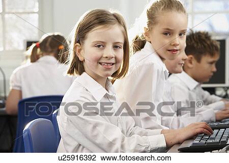Girls in school class looking to camera View Large Photo Image Stock Image - Girls in school class looking to camera. Fotosearch