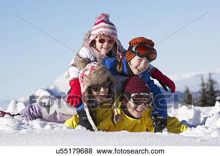 Group Of Children Having Fun On Ski Holiday In Mountains View Large Photo Image Stock Photo - Group Of Children Having Fun On Ski Holiday In Mountains. Fotosearch