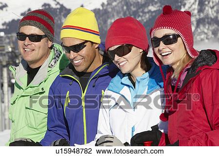 Group Of Middle Aged Couples On Ski Holiday In Mountains View Large Photo Image Stock Image - Group Of Middle Aged Couples On Ski Holiday In Mountains. Fotosearch