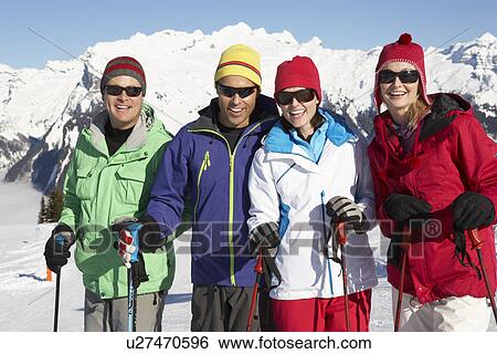 Group Of Middle Aged Couples On Ski Holiday In Mountains View Large Photo Image Stock Photograph - Group Of Middle Aged Couples On Ski Holiday In Mountains. Fotosearch
