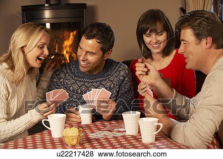 Group Of Middle Aged Couples Playing Cards Together View Large Photo Image Stock Photo - Group Of Middle Aged Couples Playing Cards Together. Fotosearch