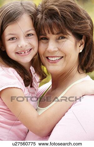 Hispanic grandmother and granddaughter View Large Photo Image Stock Photography - Hispanic grandmother and granddaughter. Fotosearch