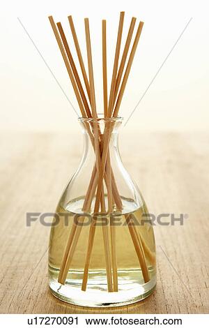 Incense sticks in carafe of water View Large Photo Image Stock Image - Incense sticks in carafe of water. Fotosearch