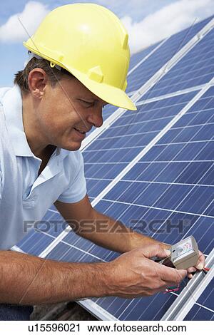 Man installing solar panels View Large Photo Image Stock Image - Man installing solar panels. Fotosearch